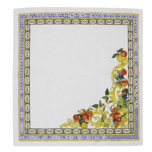 Decorative tablecloth with fruit and floral design on a white background