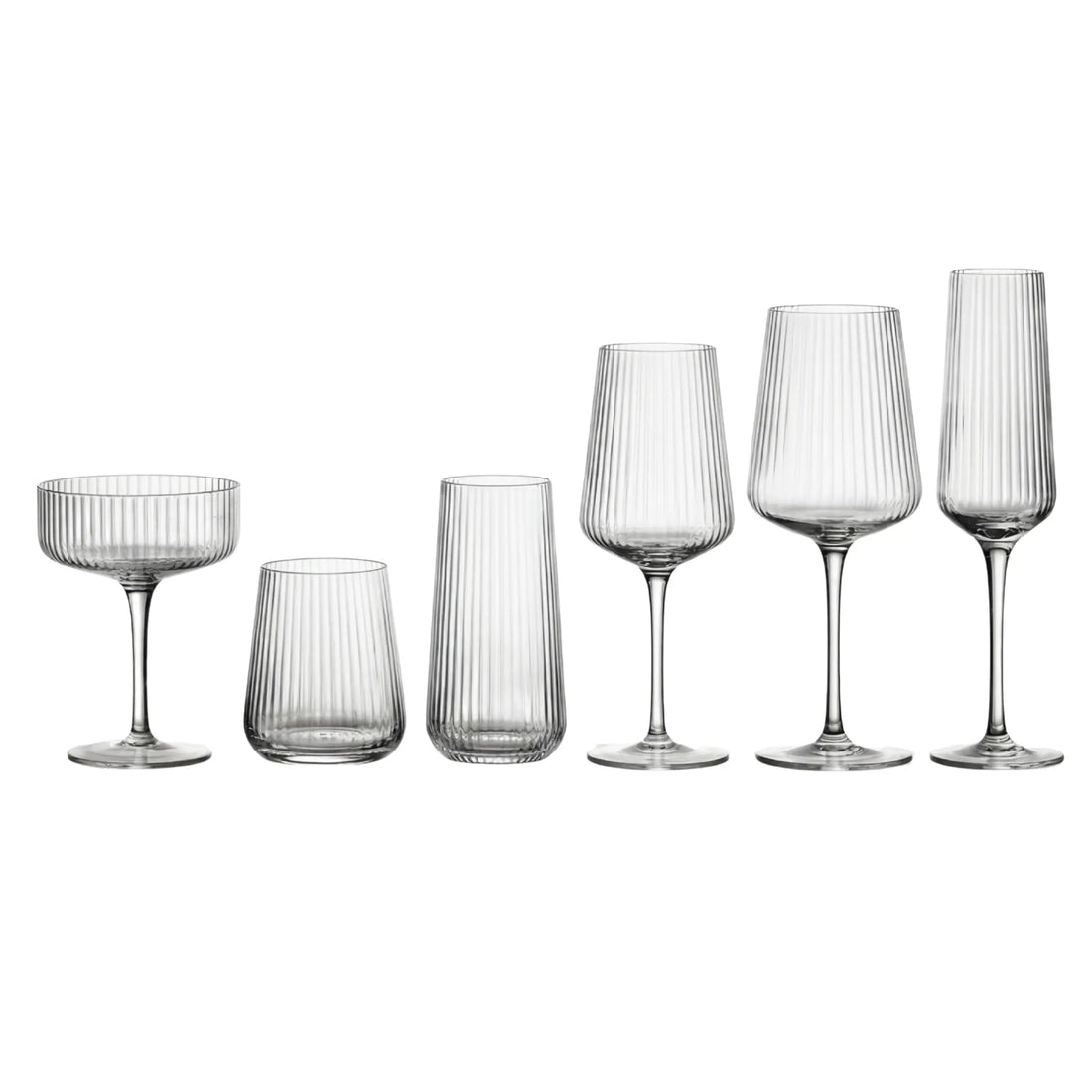 Clear Lined Glassware Collection: Six elegantly ribbed glasses including coupe, tumblers, wine glasses, and champagne flute, perfect for upscale events and entertaining.