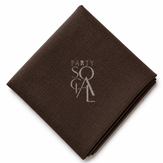 A square coffee brown linen napkin displayed diagonally on a clean white background.