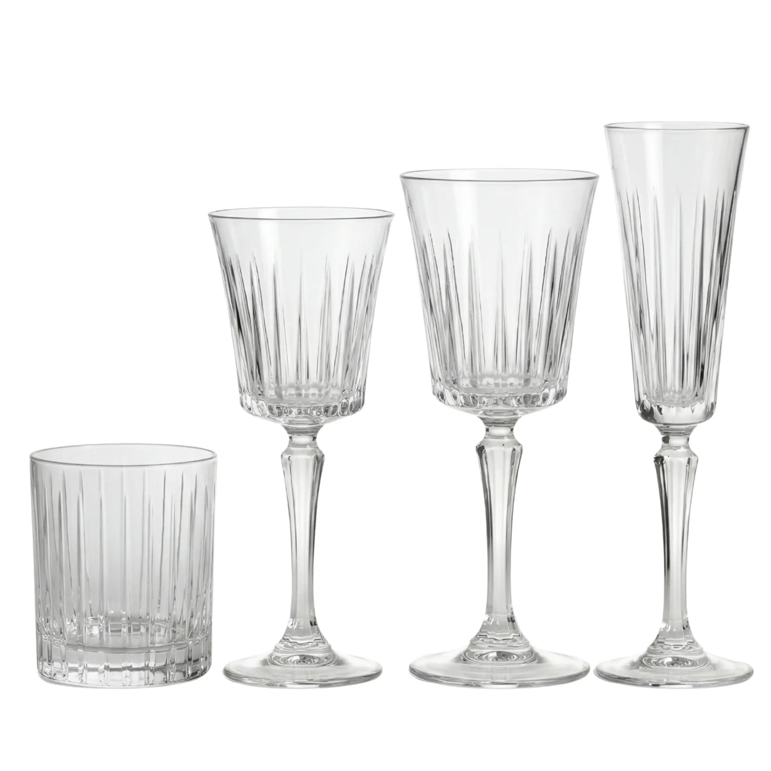 Crystal Paris Glassware Collection: Four ribbed glass pieces—tumbler, white wine, red wine glasses, and champagne flute—ideal for elegant gatherings and upscale events.