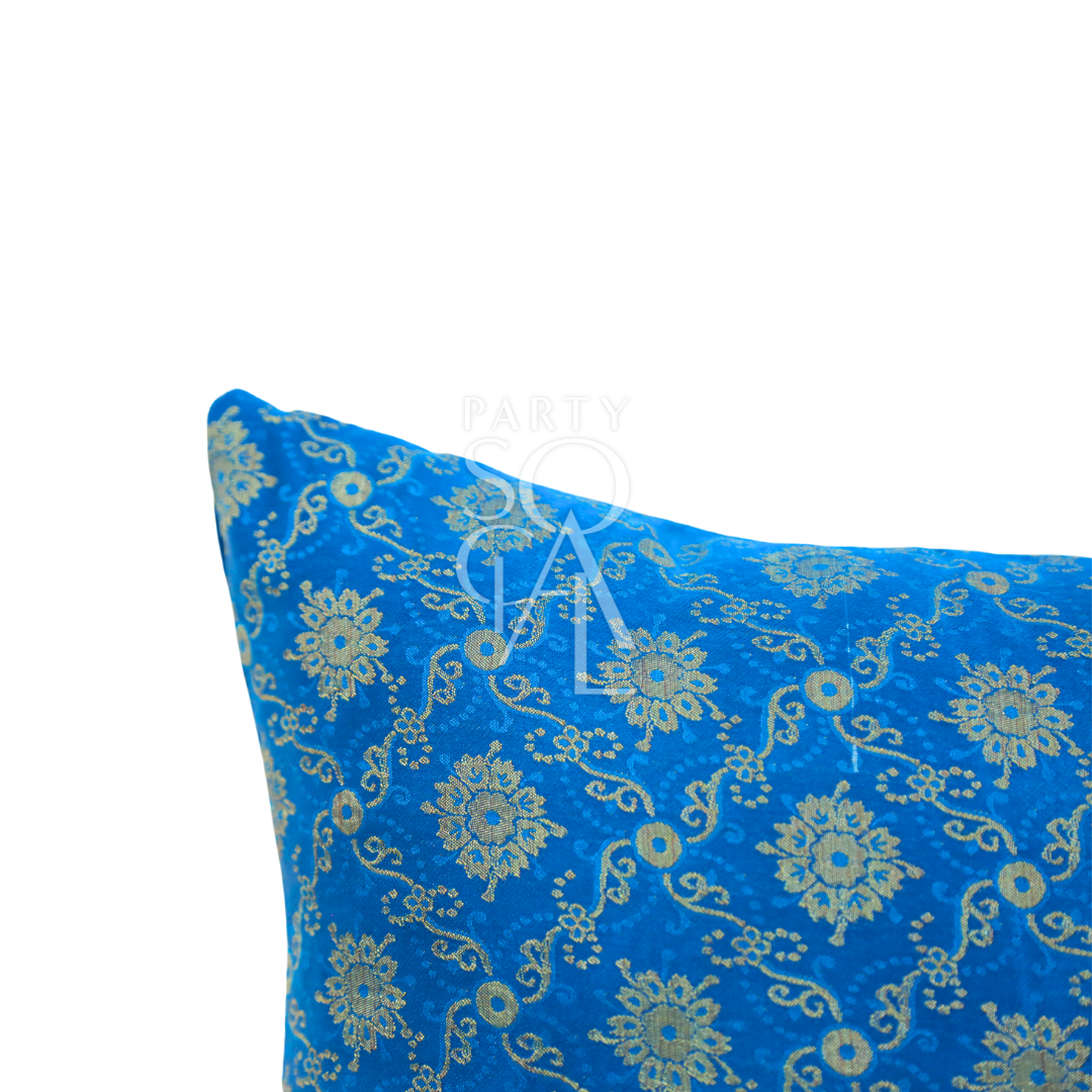 CUSHION COVER BROCADE featuring intricate gold patterns on blue brocade fabric, ideal for adding elegance to event decor.