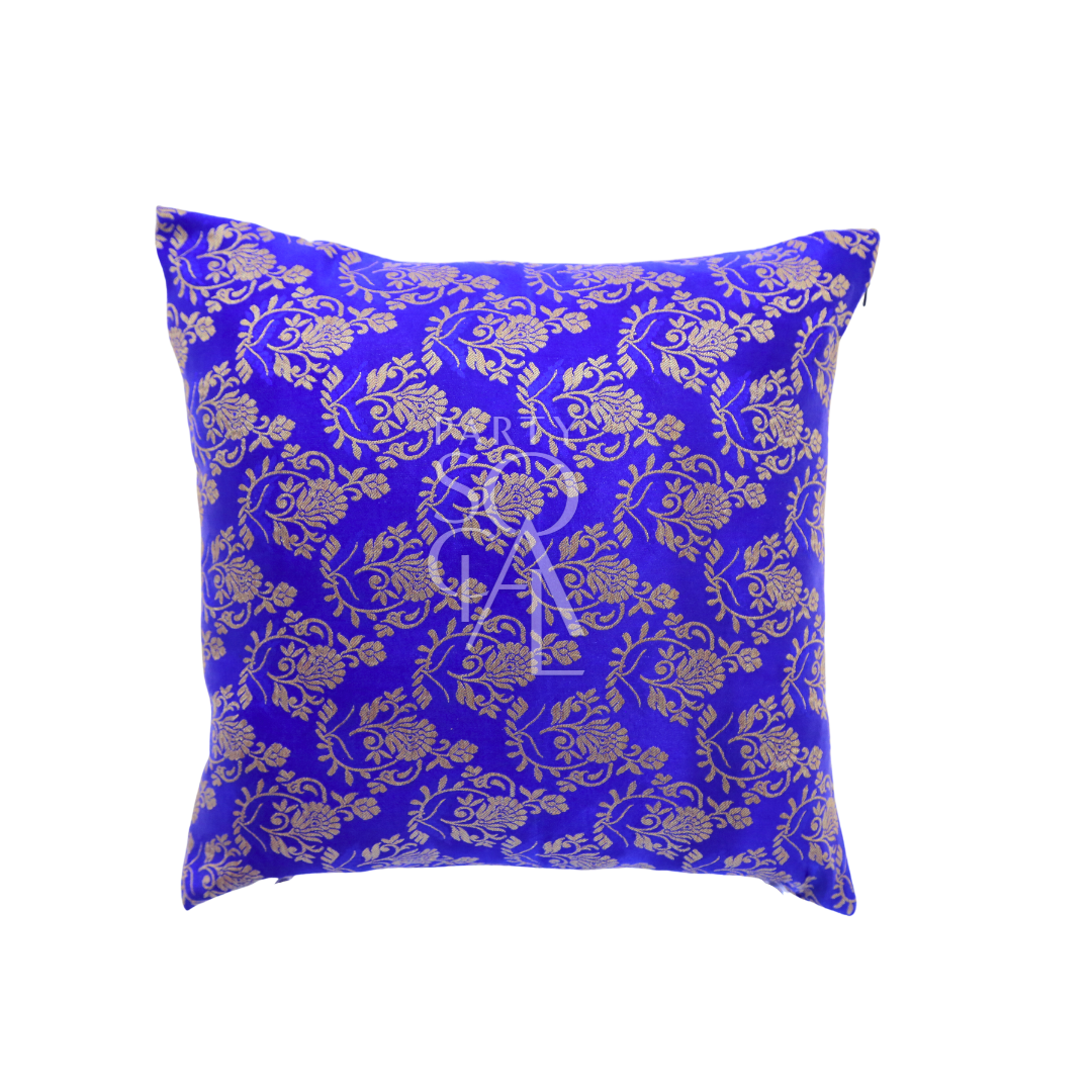 CUSHION COVER BROCADE: A luxurious blue and gold brocade pillow for elegant decor, perfect for enhancing event settings with a touch of sophistication.