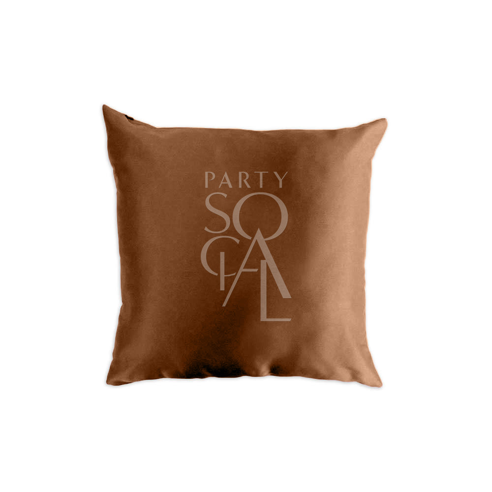 CUSHION COVER SATIN: Brown pillow featuring a logo, crafted in premium satin fabric. Available in multiple sizes, ideal for enhancing event decor.