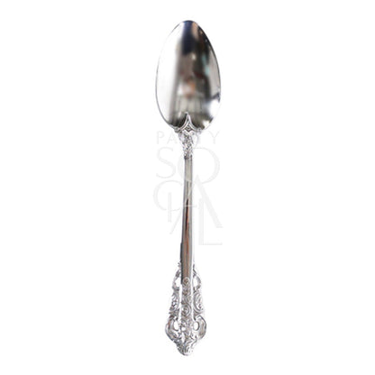 Cutlery Vintage Silver (Set of 4 Piece) - A close-up of a vintage silver spoon, part of a striking cutlery set for elegant dining occasions.