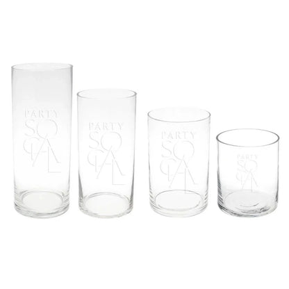 A group of elegant cylinder glass vases, perfect for brightening tables or consoles. Versatile sizes available: Extra Small, Small, Medium, Large. Candles sold separately. Tableware from Party Social Dubai.