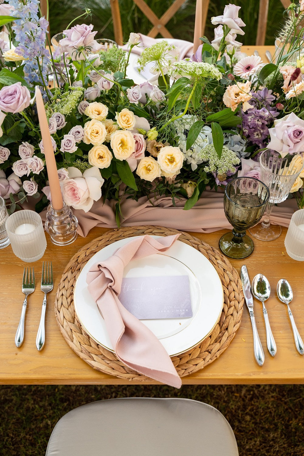 CANE PLACEMAT on a table setting with a plate, cutlery, and flowers, ideal for enhancing any event decor.