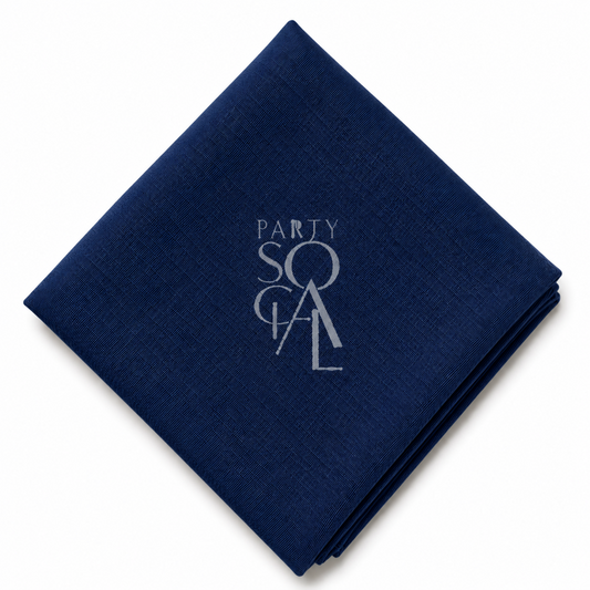 A square Dark Blue linen napkin displayed diagonally on a clean white background.

