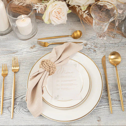 Modern China w/ Gold Rim Plates on an elegant table setting with gold cutlery and white rose centerpiece, ideal for premium events and special occasions.