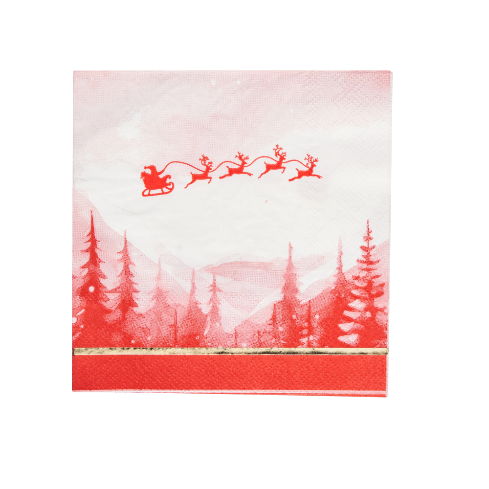 Christmas Village Cocktail Napkins, featuring Santa on a sleigh with reindeer, add festive charm to holiday events. Available in a pack of 20.