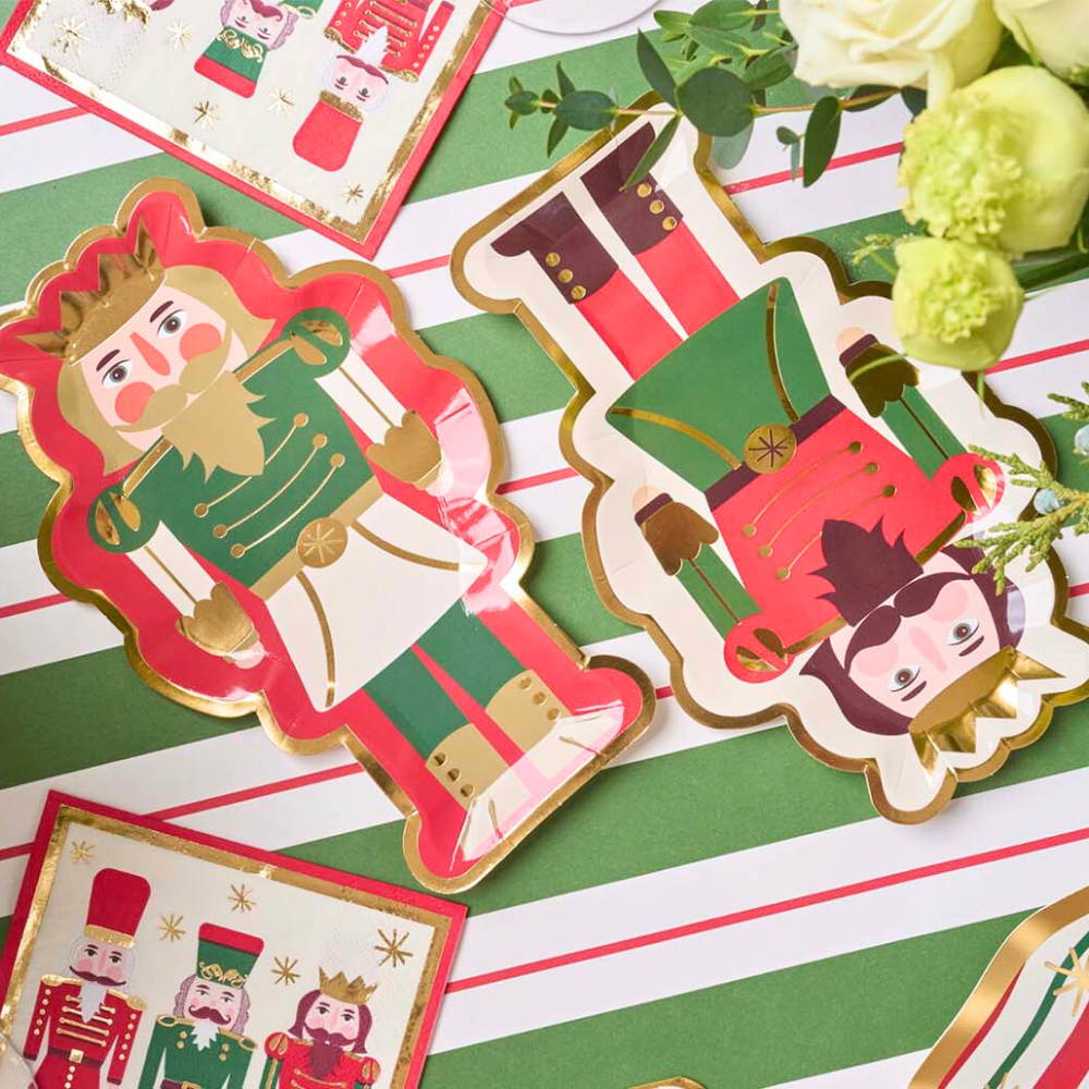 Assorted Nutcracker Salad Plates, set of 8, featuring nutcracker designs, ideal for festive gatherings. Perfect for enhancing holiday dining experiences from Party Social.