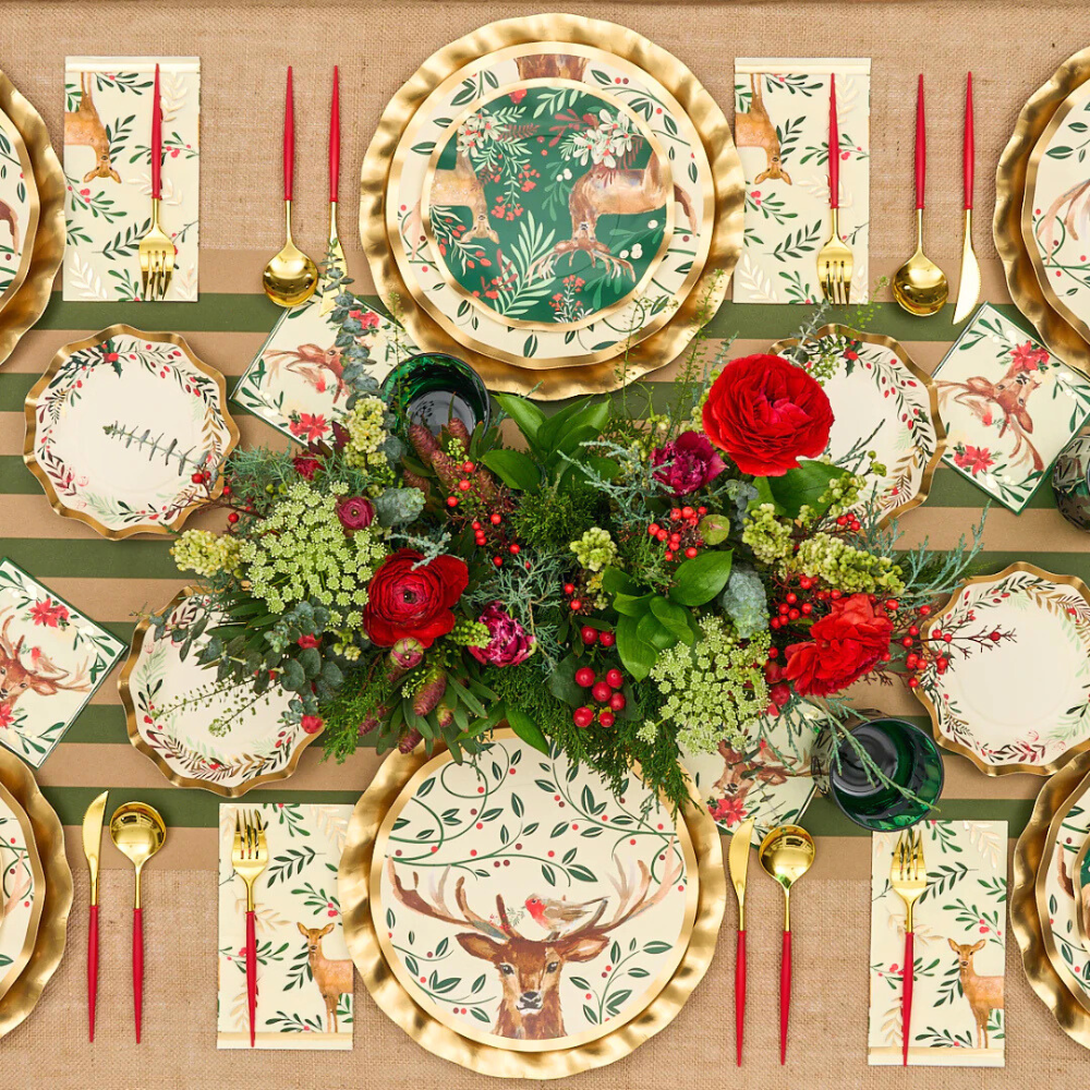 Bella Cutlery in Gold and Red, featuring sleek, modern design, displayed elegantly on a table set with patterned plates, enhancing any event setting.