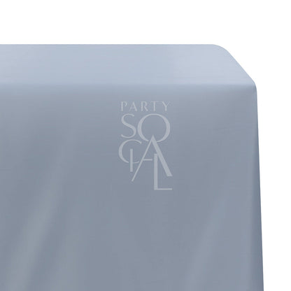 Rectangular Tablecloth Satin with a subtle logo, perfect for enhancing special occasions with its premium satin finish, available in various colors for versatile event styling.