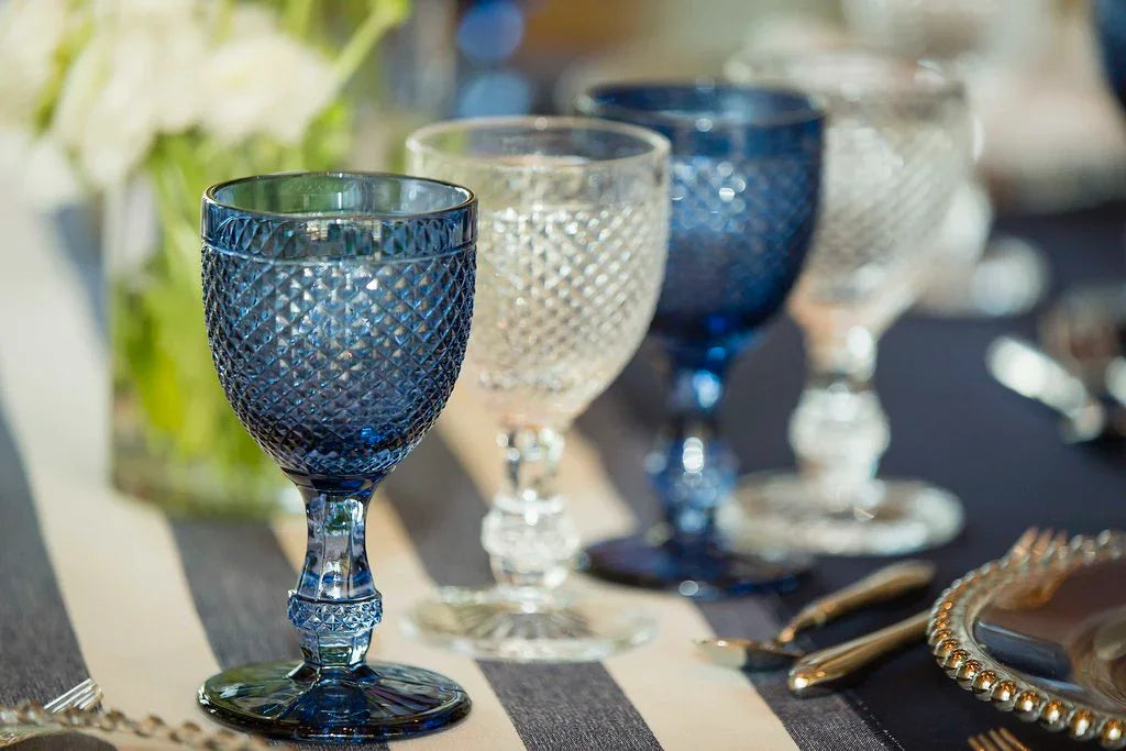 Navy Blue Vintage Diamond Goblet on a set table with silver cutlery and a decorative plate, ideal for enhancing party and event settings.