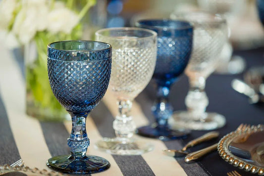 Navy Blue Vintage Diamond Goblet on a set table with silver cutlery and a decorative plate, ideal for enhancing party and event settings.