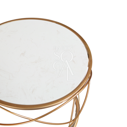 GOLD WIRE WITH MARBLE TOP COFFEE TABLE featuring a round white surface and gold metal legs, ideal for corporate events and home functions.