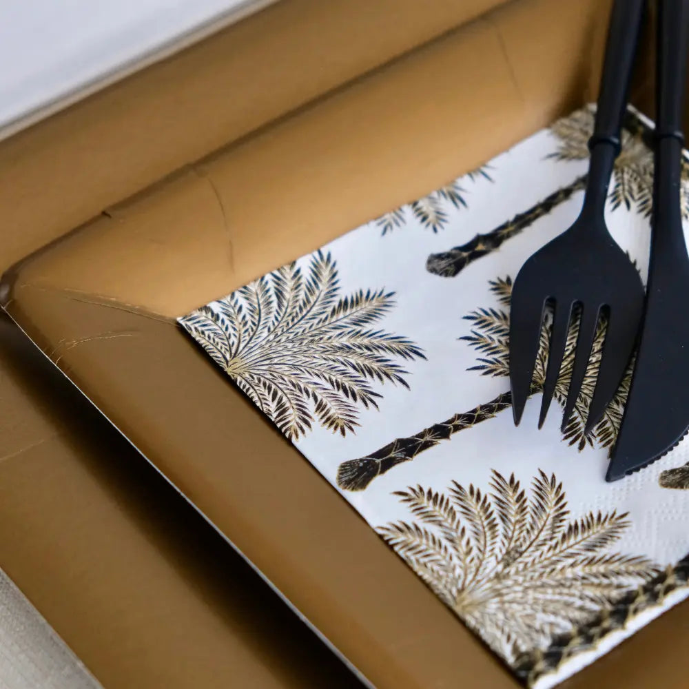 Placemat with palm tree design on a brown surface