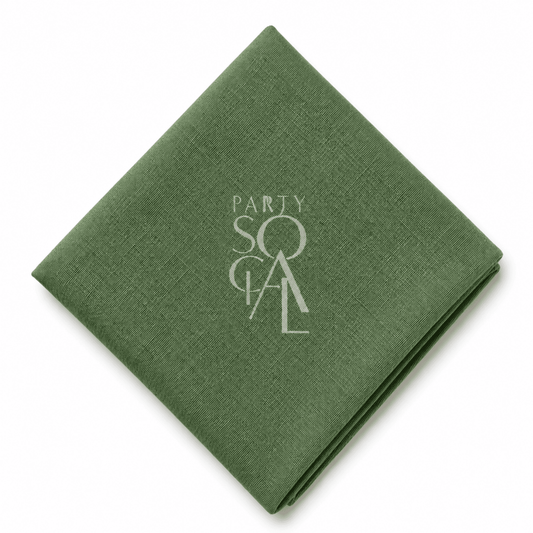 A square Green linen napkin displayed diagonally on a clean white background.