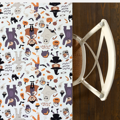 Trick or Treat Polyester Halloween Tablecloth featuring playful Halloween character patterns, perfect for adding a festive touch to your party table setting.