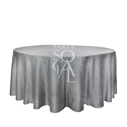 Round tablecloth jacquard showcasing a speckled pattern, ideal for enhancing any event setting with elegance, as offered by Party Social.