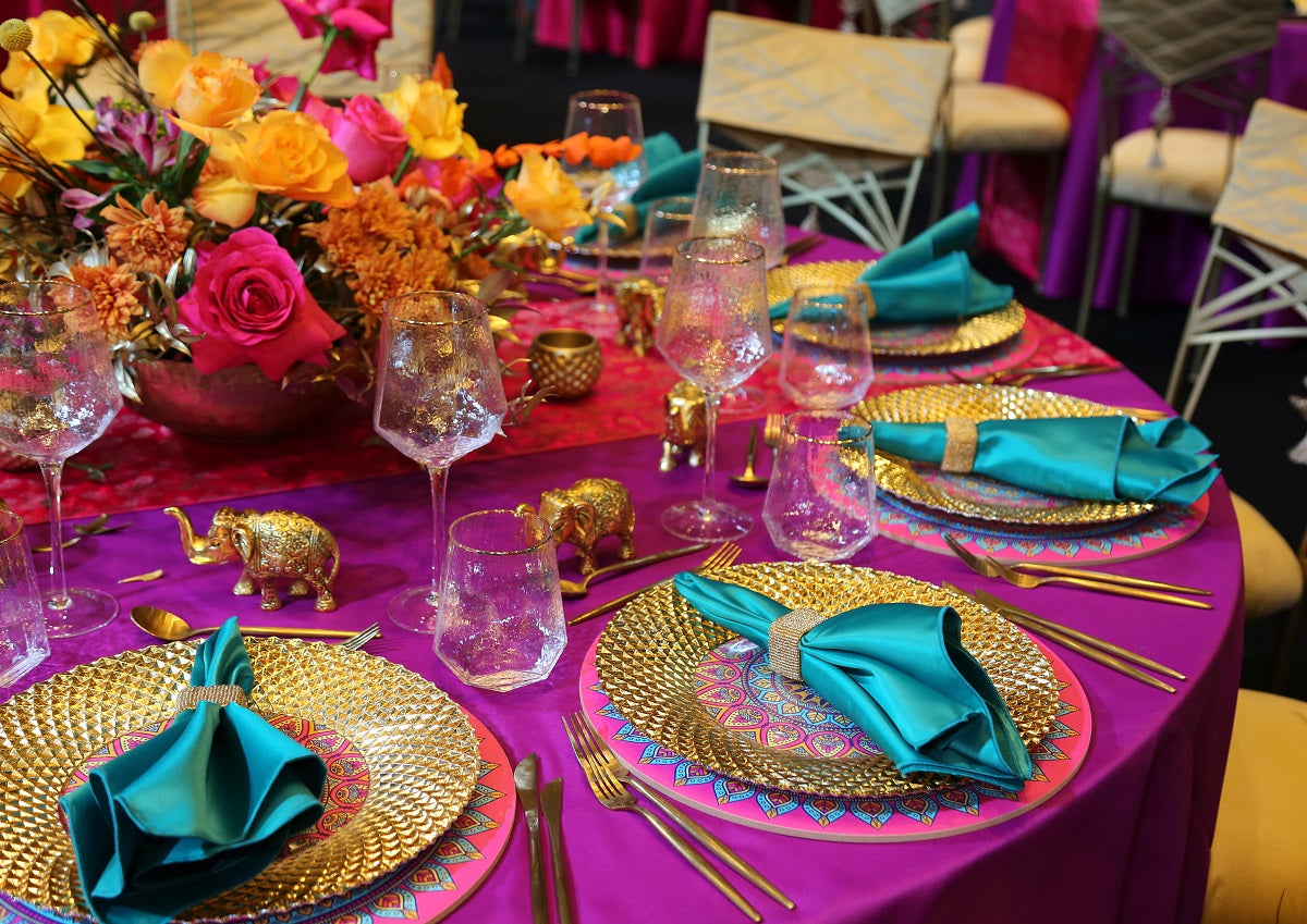 Arabesque Wood Placemat on an elegantly set table with wine glasses and tableware, enhancing the sophisticated ambiance for events and special occasions.