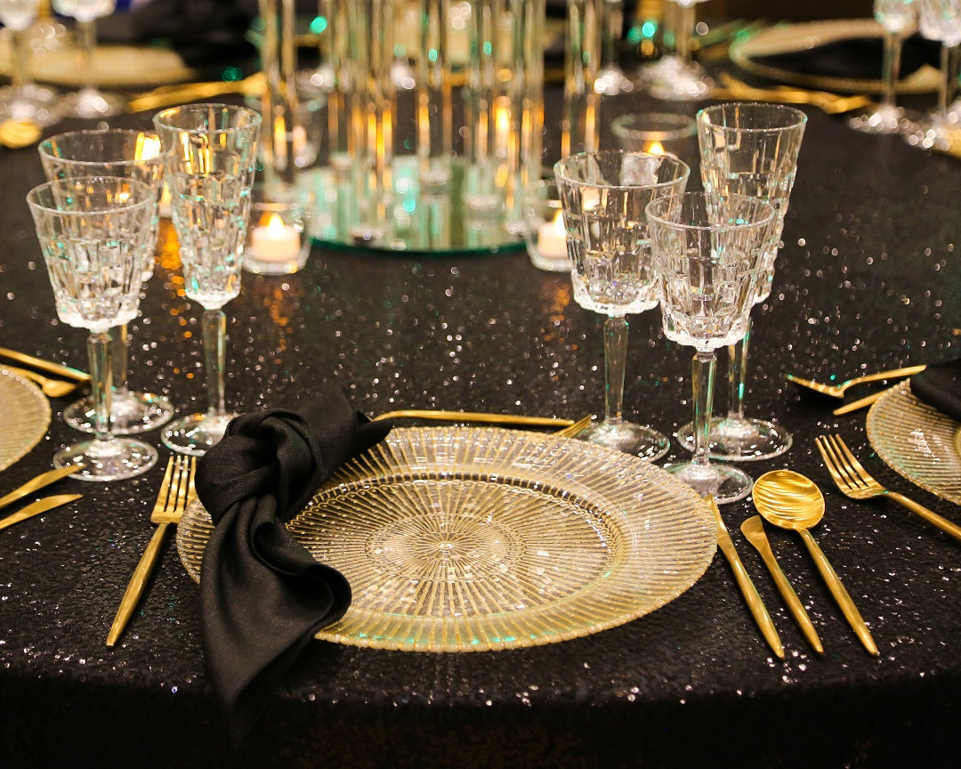 CRYSTAL MYKONOS GLASSES displayed elegantly on a table, paired with cutlery, showcasing a polished finish suitable for premium events and stylish dinner parties.