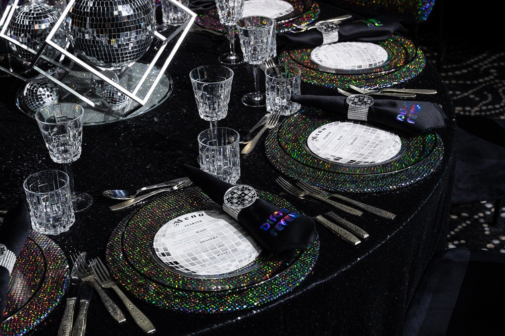 Disco Round Placemat on a table set with glasses, cutlery, and plates, adding elegance to the party setting from Party Social.