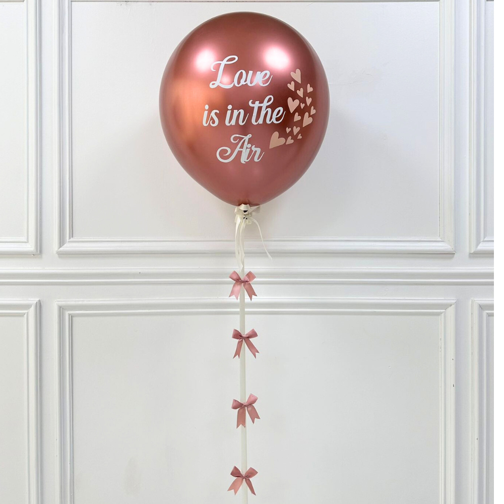 Reflective Helium Giant Balloon with a handmade ribbon tail, perfect for adding style to any celebration or party.