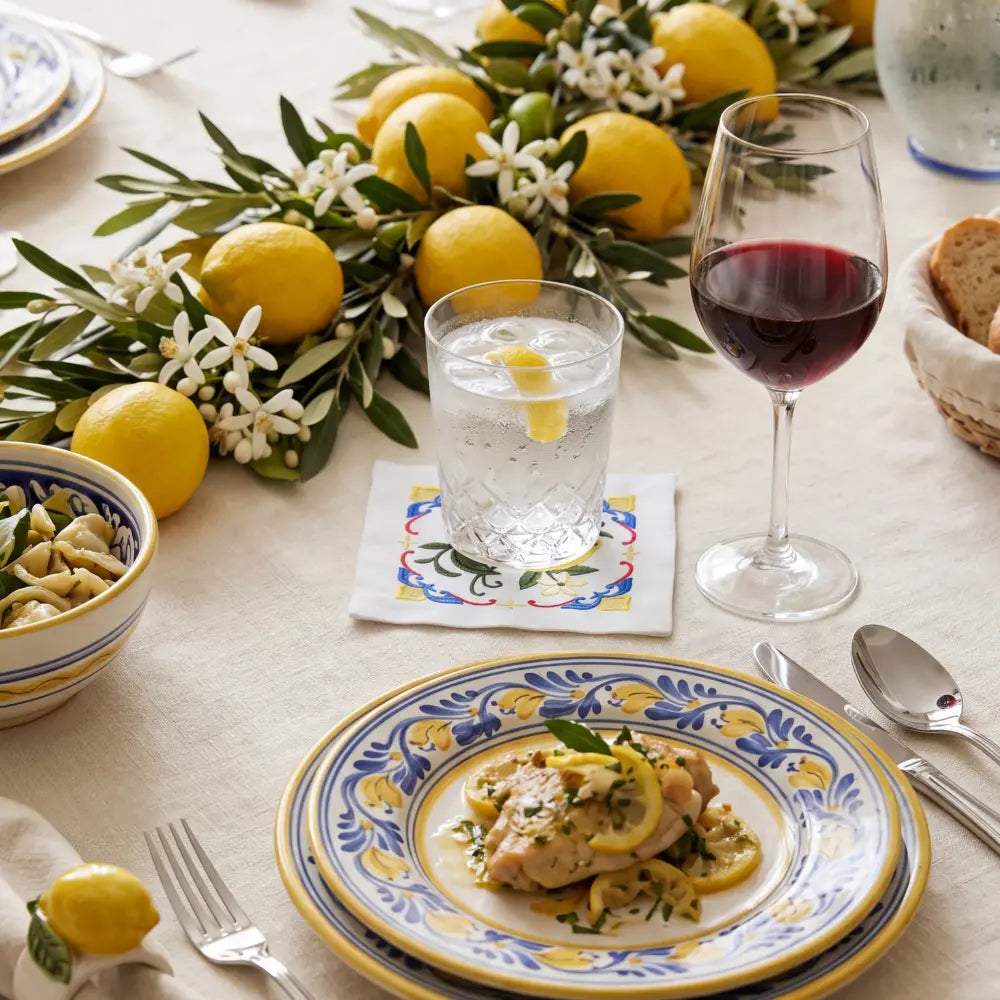 Majolica Lemon Pure Linen Coaster set, featuring white coasters with embroidered yellow lemons and flowers, perfect for elegant table settings. Pack of 4.