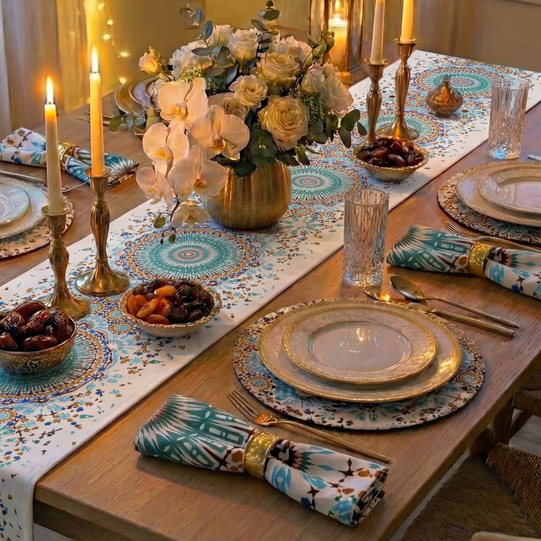 Arabesque Polyester Linen Placemats elegantly complement a formal dining setup with gold accents and floral centerpiece, enhancing the luxurious table arrangement for special occasions.