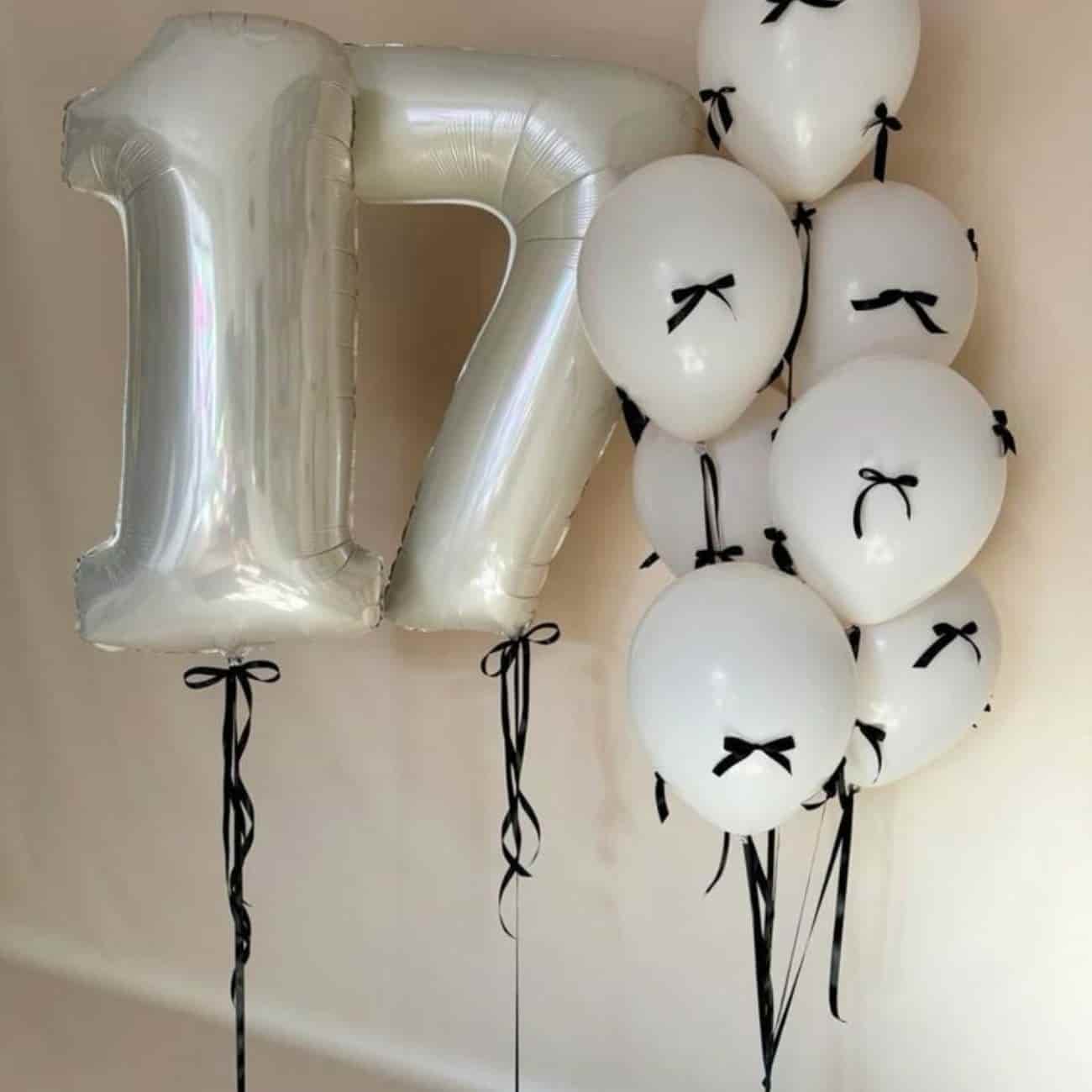 Signature Letter Balloon Bouquet featuring metallic-silver 17 balloons and a white latex balloon cluster, perfect for a stylish and dreamy graduation celebration.