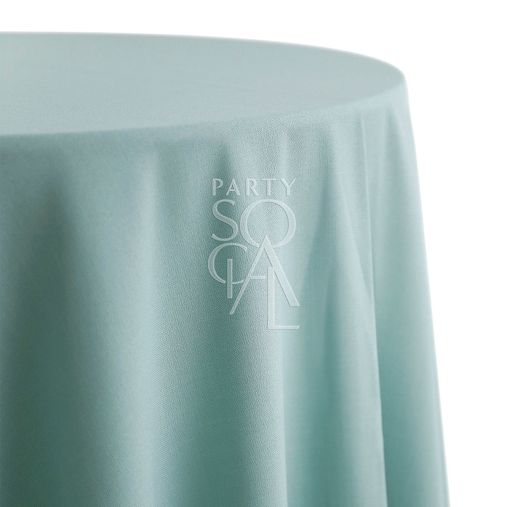 ROUND TABLECLOTH COTTON LINEN displayed on a round table, showcasing its elegant drape and texture, ideal for enhancing any special occasion setting.