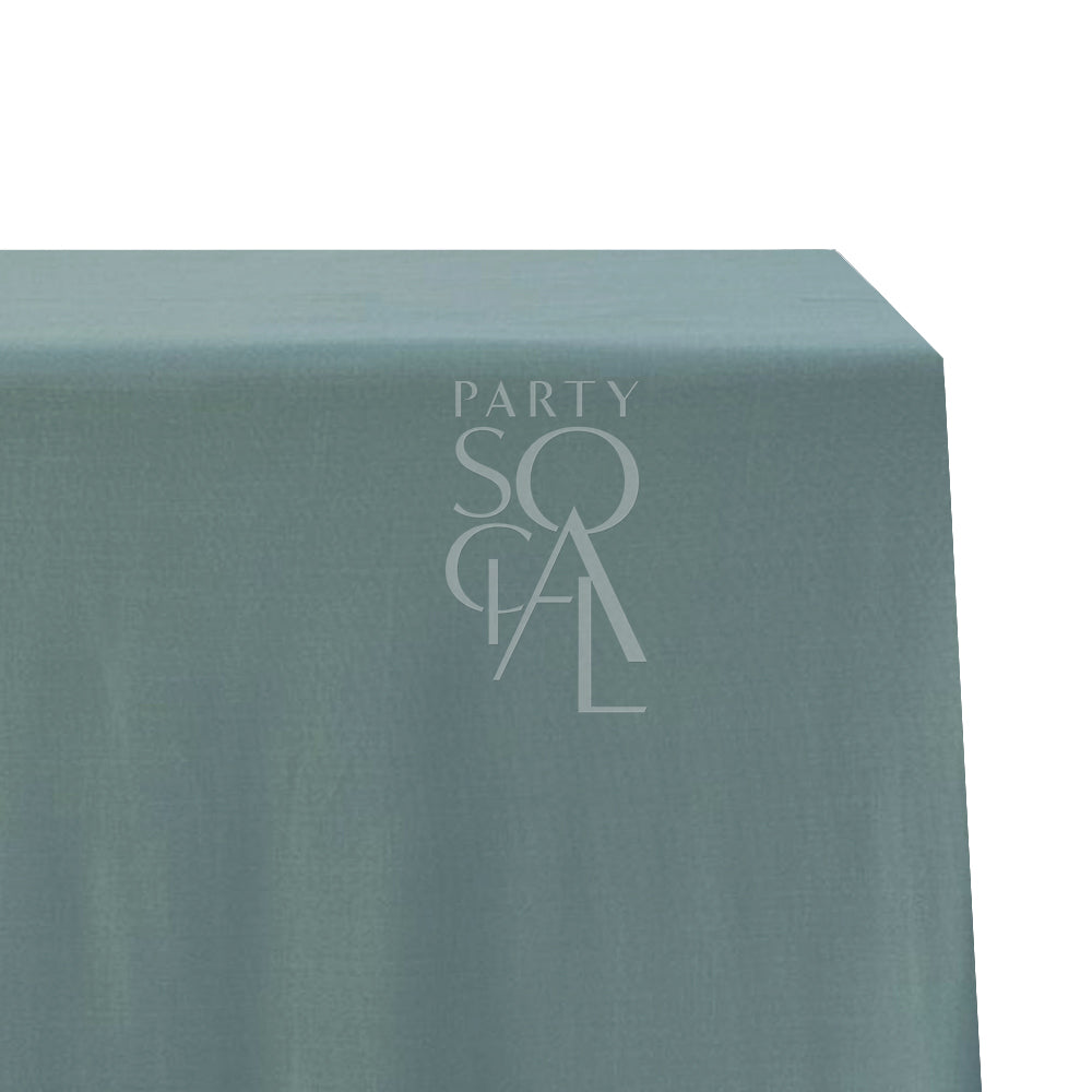 Rectangular tablecloth in premium cotton linen featuring a subtle logo, ideal for special occasions and events.