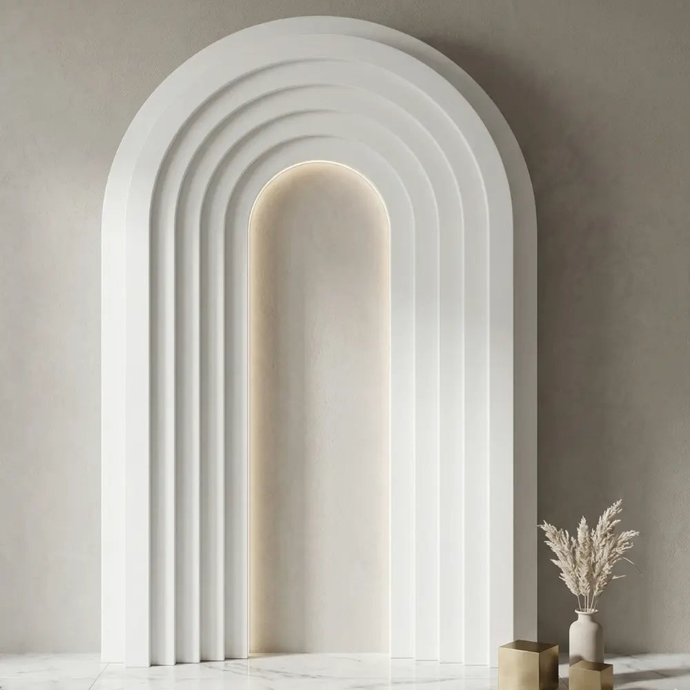 Molded Pure Backdrop with concentric panels and warm backlight, perfect for modern events. Accented with a ceramic vase and metallic cubes.