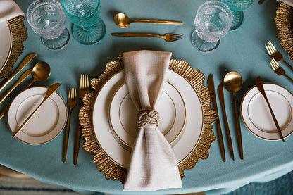 NAPKIN RING - CORDED JUTE ROUND, elegantly displayed on a table setting with silverware and tableware, ideal for enhancing any party or event decor.