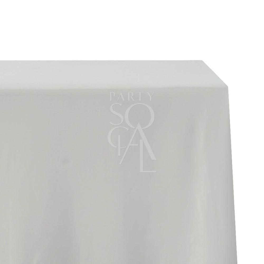 Rectangular cotton linen tablecloth featuring a subtle logo, ideal for enhancing special occasions with elegance.