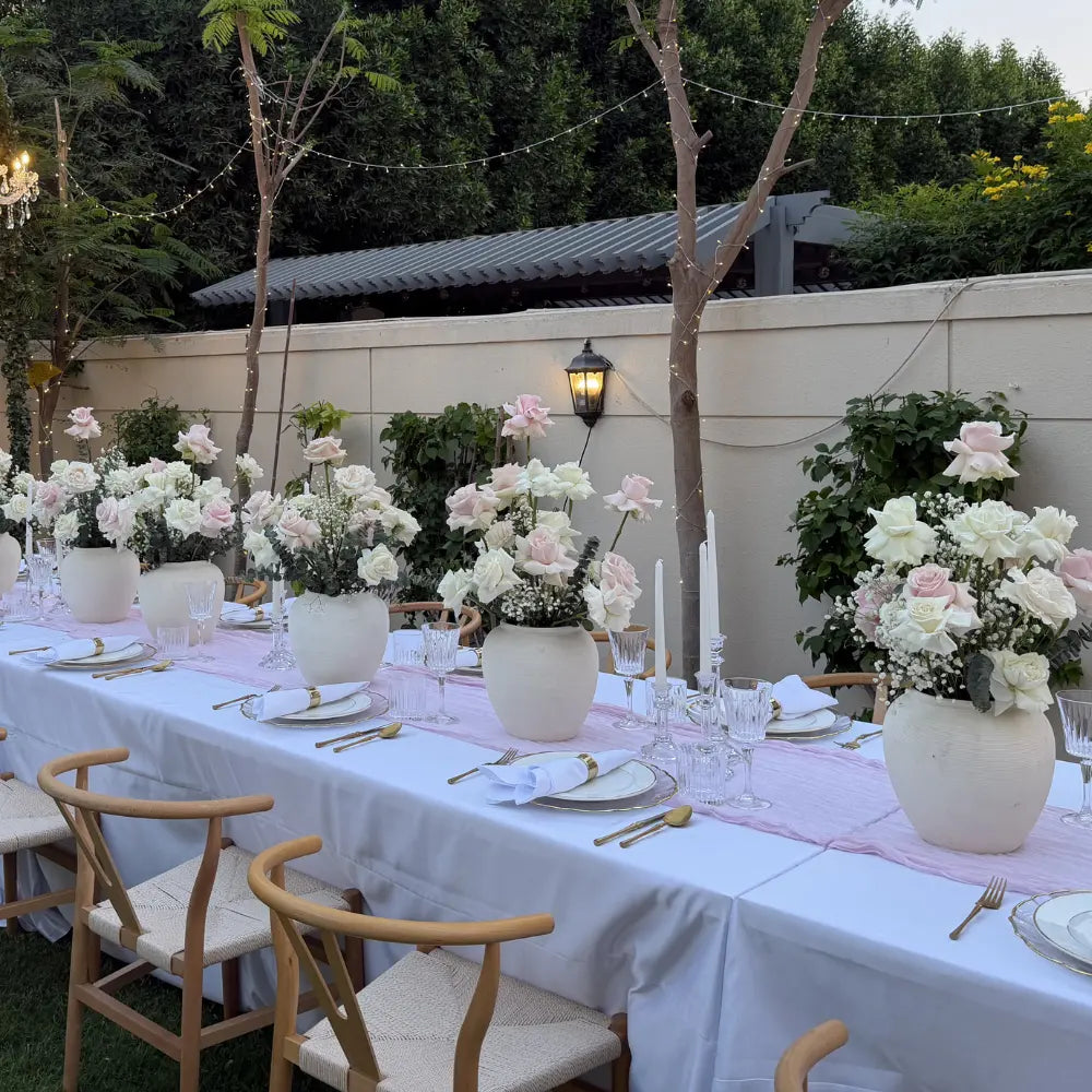 Off White Lined Pot, versatile earthenware piece suitable for flowers or decor, ideal for themed events. Available in two sizes at Party Social.