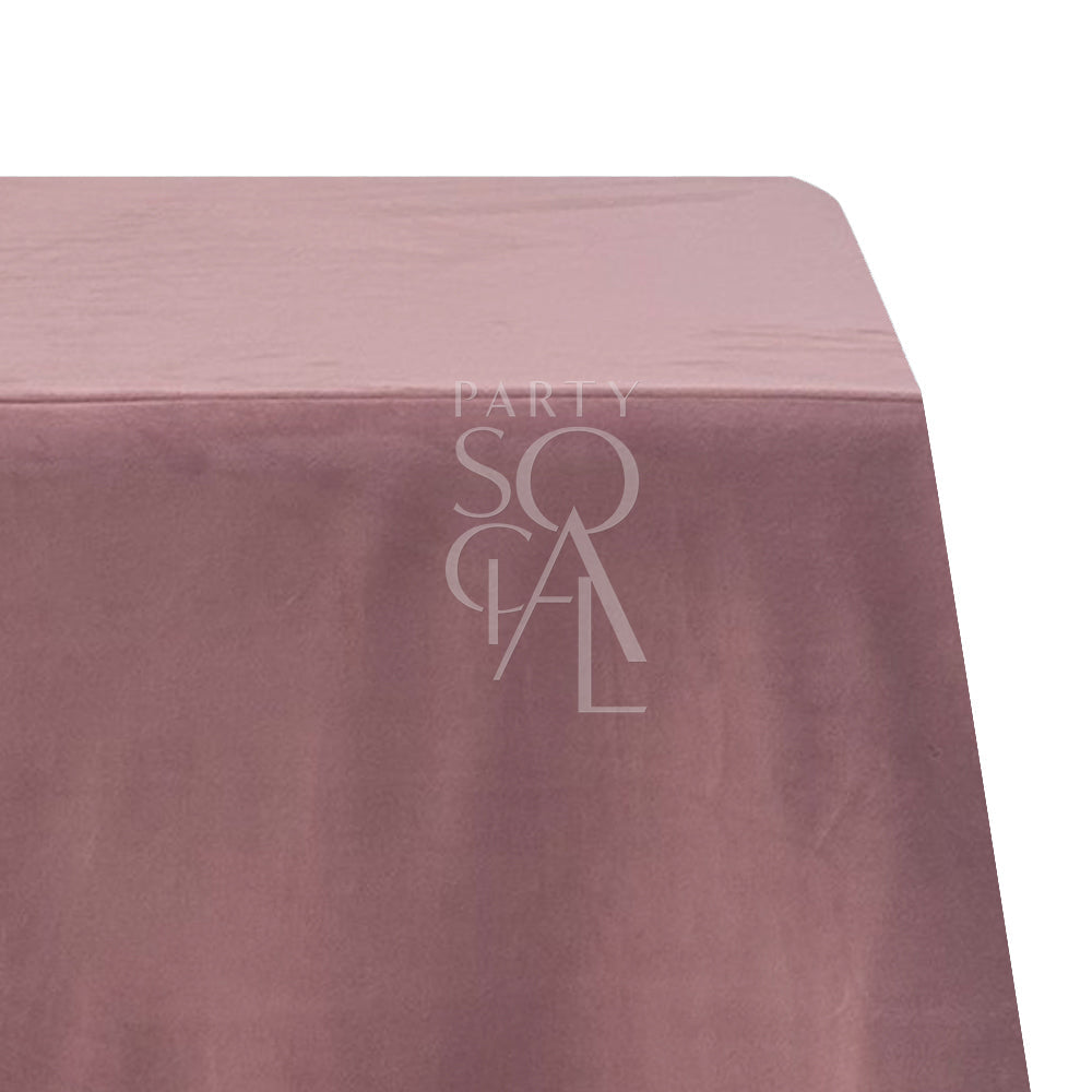 Rectangular Tablecloth Velvet, featuring a pink cloth with a white logo, perfect for events and special occasions with premium cotton linen.