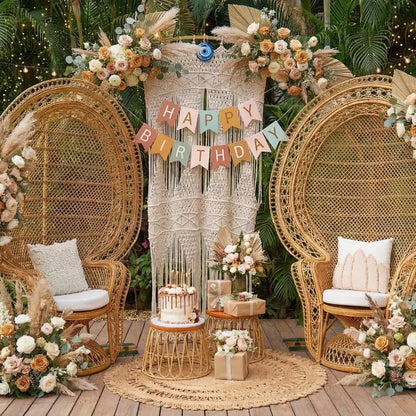 Peacock Chair amidst boho birthday setup with macramé backdrop, wicker stools with cake and gifts, and lush floral decor, epitomizing elegant event styling.