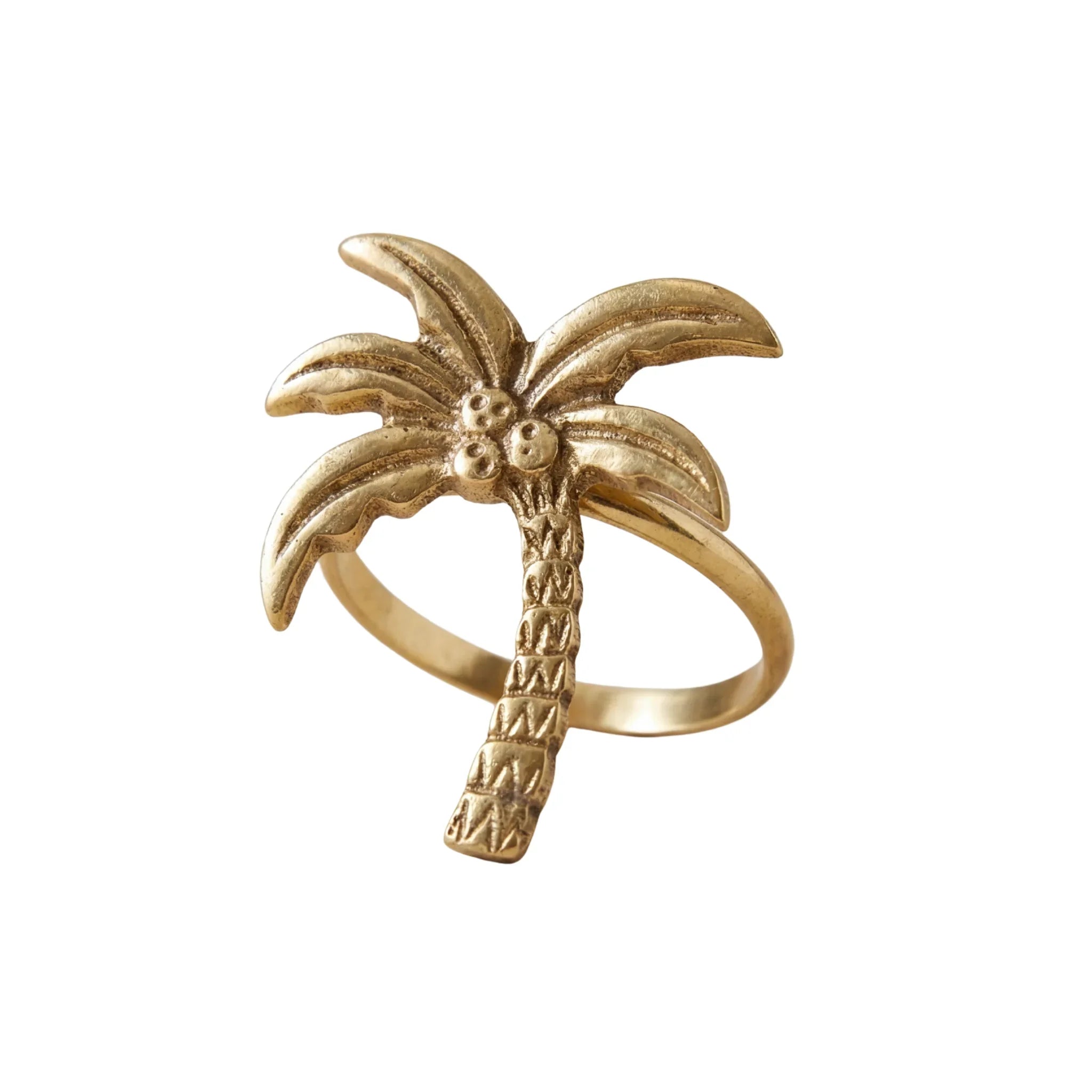 Brass Palm Tree Napkin Ring, featuring a textured palm tree design with fronds and coconuts, perfect for adding a tropical touch to your dining experience.