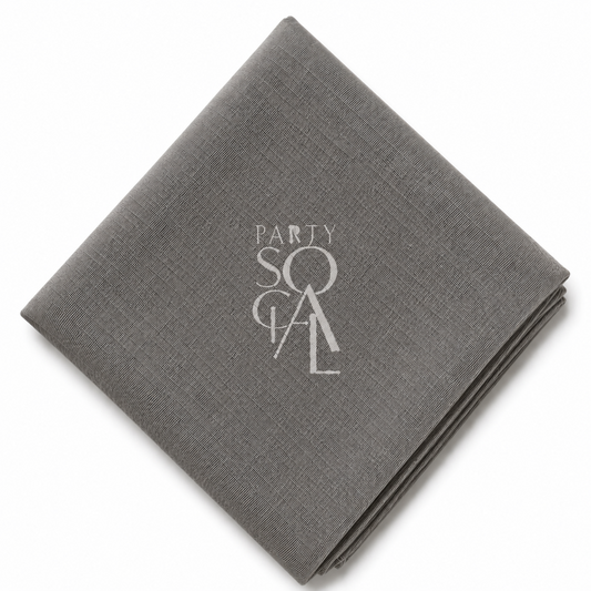 A square pavement linen napkin displayed diagonally on a clean white background.
