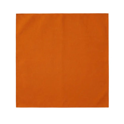 Polycotton Napkins - 4 per pack, featuring a warm orange fabric square, ideal for enhancing dining table settings with reusable, easy-care polyester.