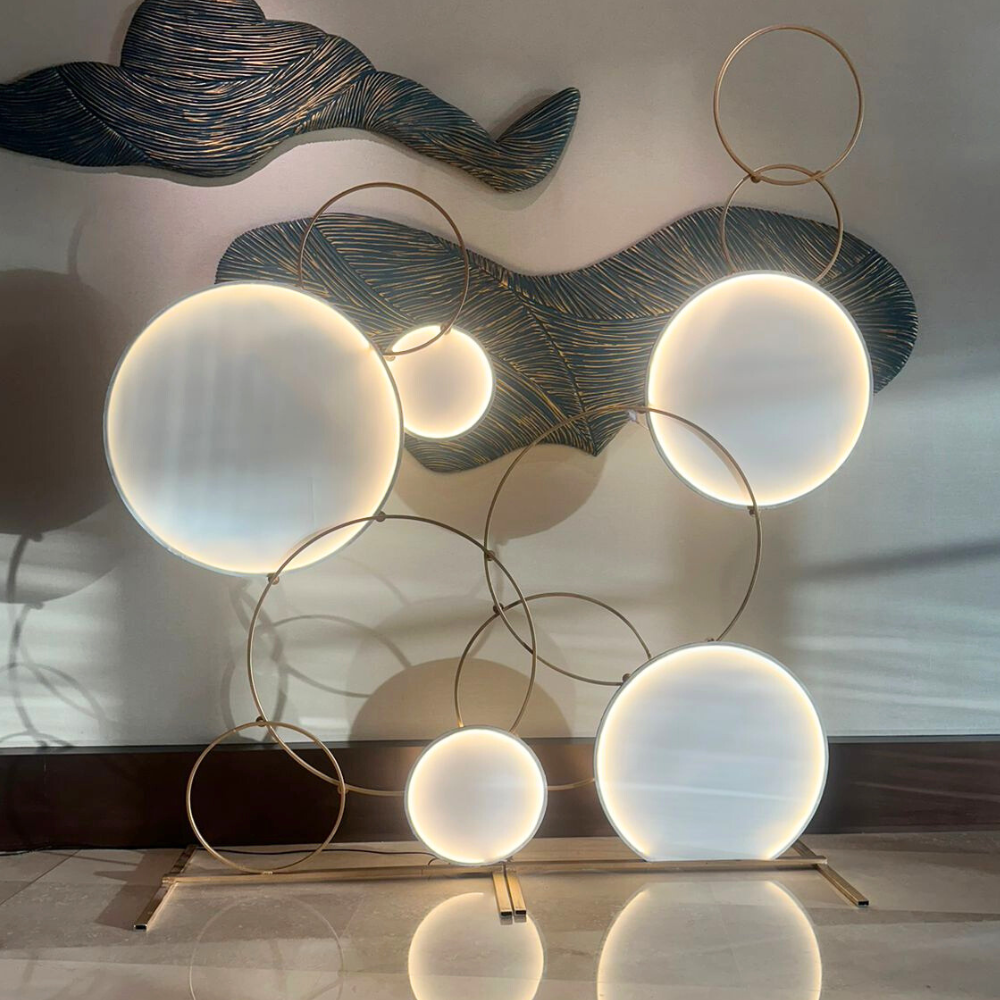 CircleScape LED Backdrop, a circular metal LED sculpture, ideal as an event centerpiece for weddings, baby showers, or parties. Measures 250cm in height.