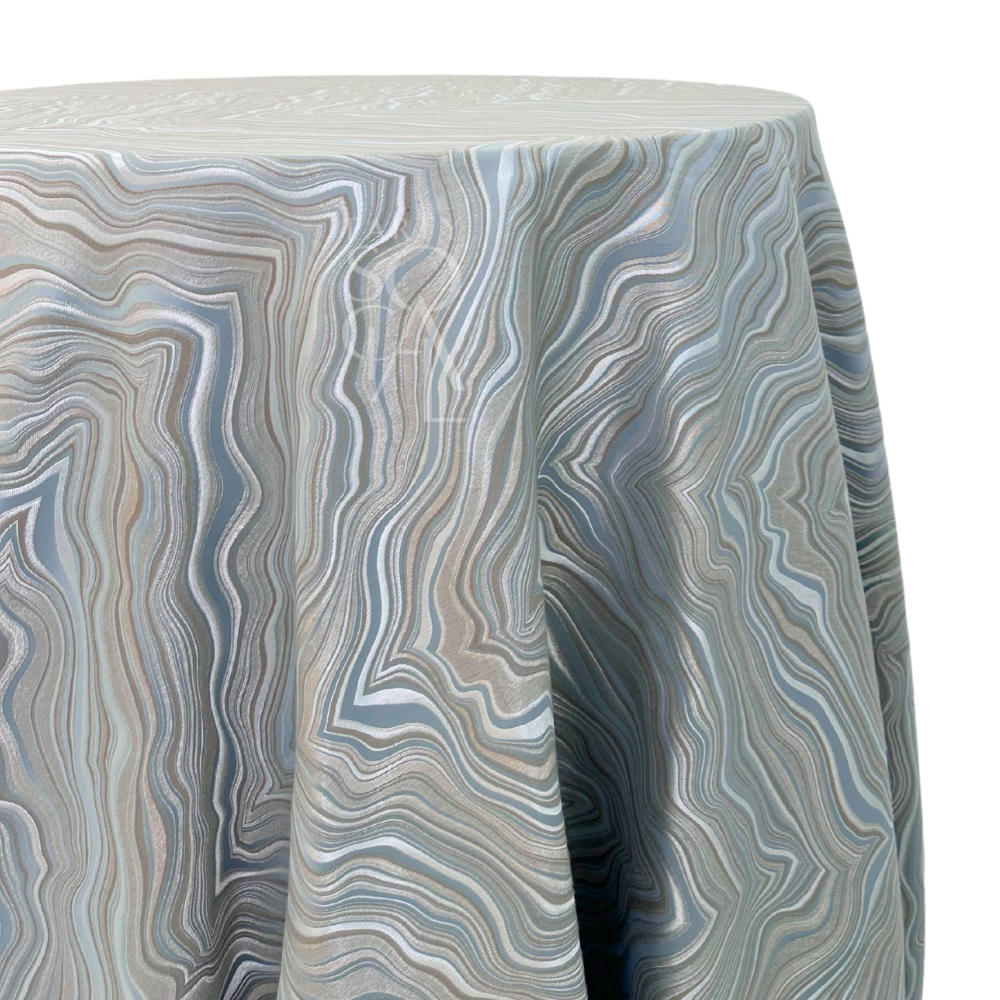 MARBLE DRIP PATTERN ROUND TABLECLOTH, featuring an elegant mix of grey, steel blue, beige, and off-white hues, ideal for elevating your event décor.