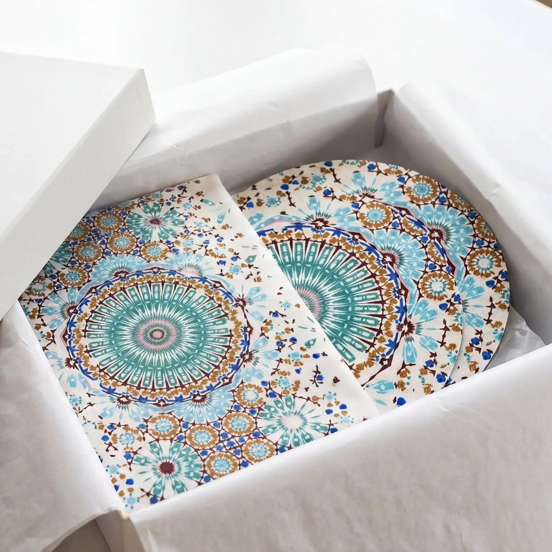 Arabesque Gift Box with teal-blue mandala flatware set, including coasters and placemats, perfect for elegant Ramadan gatherings and gifting from Party Social.