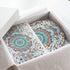 Arabesque Gift Box with teal-blue mandala flatware set, including coasters and placemats, perfect for elegant Ramadan gatherings and gifting from Party Social.