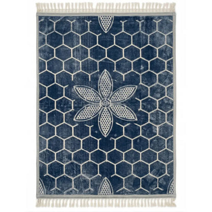 RUG BLUE SELF PRINT: Navy-blue rug with white hexagon grid and central flower motif, accented by tassel fringes, ideal for elevating any event setting.