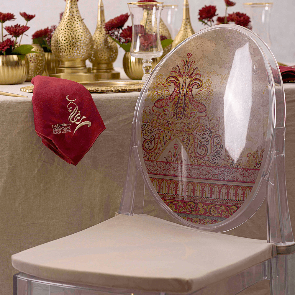 Vintage Arabesque - Dining Setup featuring a chair with a red napkin, part of an elegant table arrangement for eight guests.