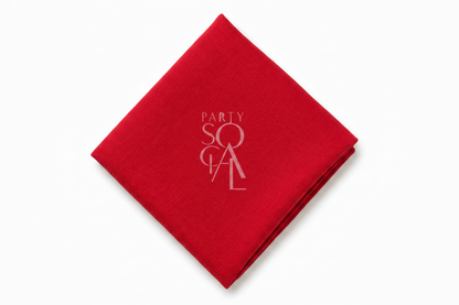 A square Red linen napkin displayed diagonally on a clean white background.
