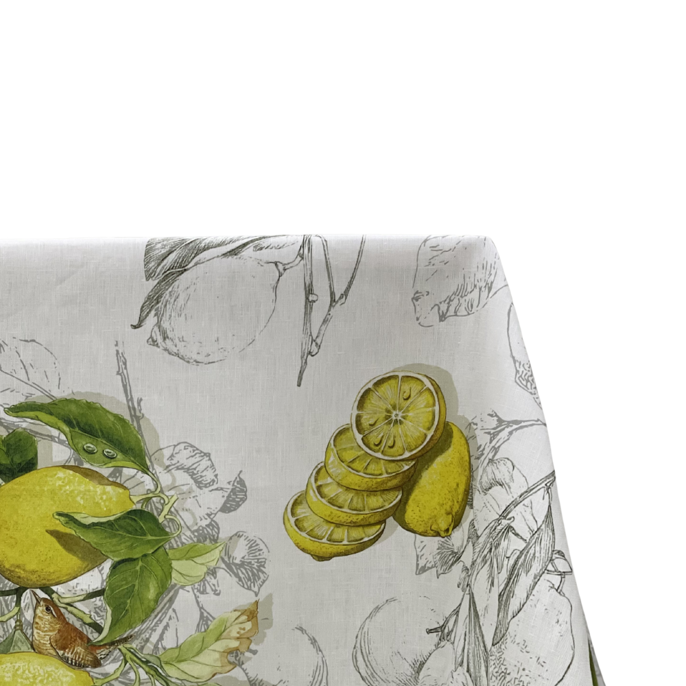 Limoncello Pure Linen Tablecloth features a botanical lemon motif with lemons, slices, leaves, and a bird, offering a premium look for any event.