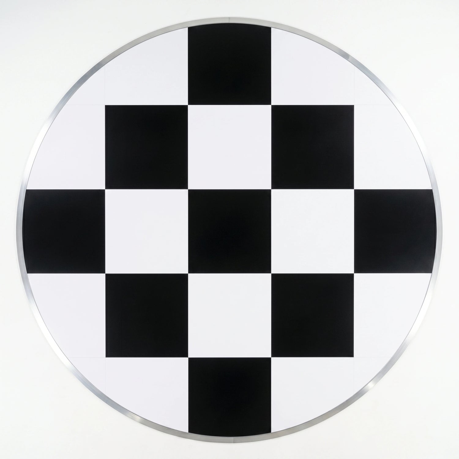 A circular dance floor a black and white checkerboard pattern with a polished silver metallic rim for weddings &amp; events 